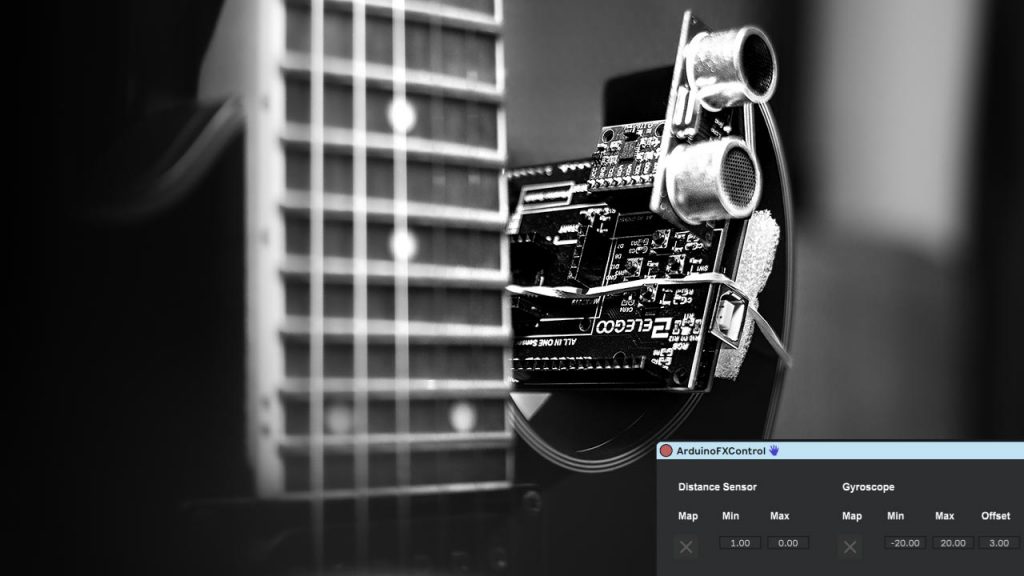 Arduino mit Sensoren an E-Gitarre befestigt